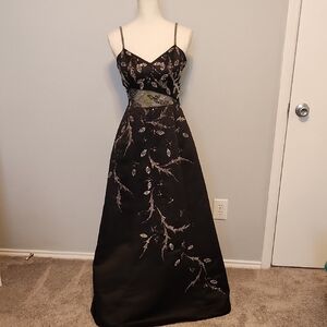 Striking Black Formal Dress With Intricate Beading.